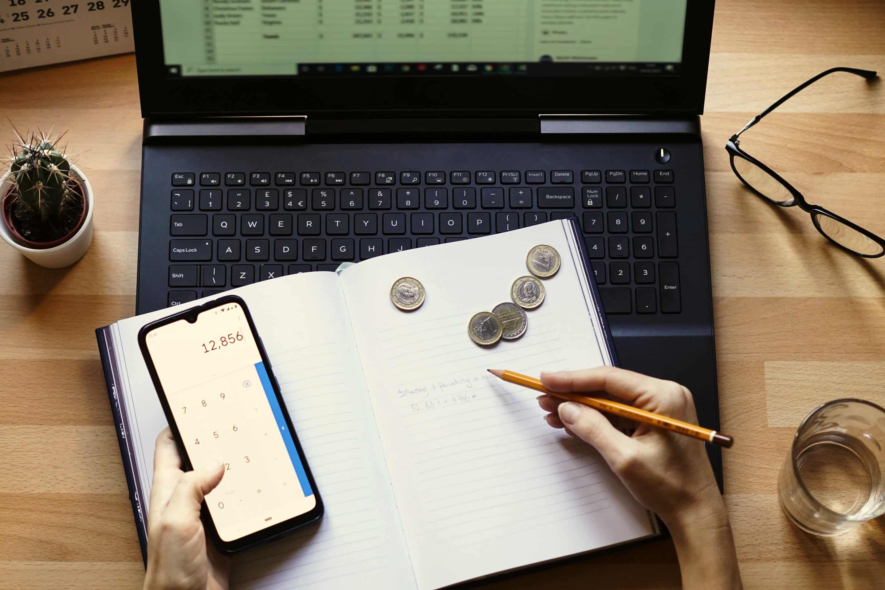 closeup-shot-entrepreneur-working-from-home-his-personal-finances-savings