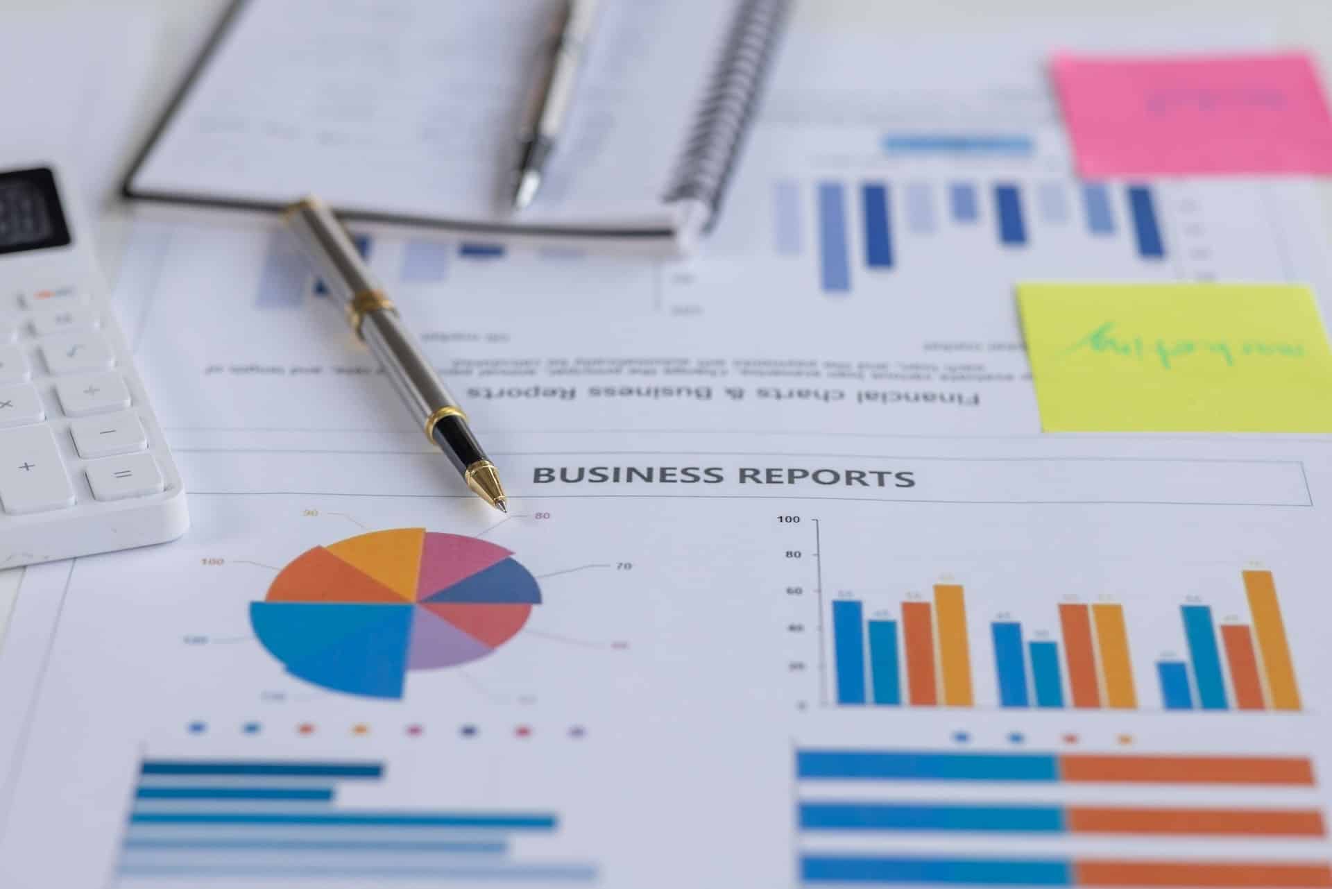 group-of-confident-business-people-point-to-graphs-2026-01-08-05-39-48-utc